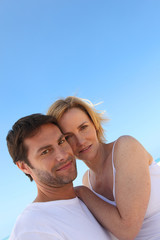 Fototapeta premium Couple and a blue sky