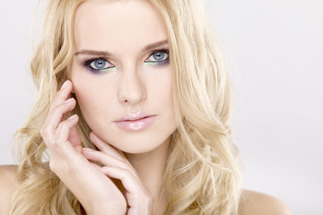 Naklejka premium Young pretty woman with beautiful blond hairs