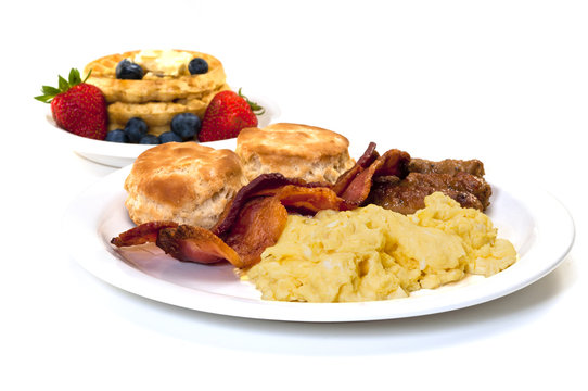 Breakfast with Eggs, Bacon , Sausage, Biscuits  and Waffles