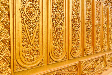 Golden Thai pattern close up tilted out