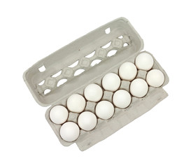 White eggs in cardboard carton