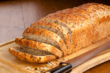 Sliced loaf of bread with mixed seeds