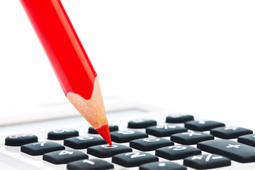 Rotstift und Taschenrechner