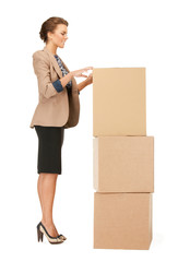 attractive businesswoman with big boxes