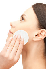 beautiful woman with cotton pad