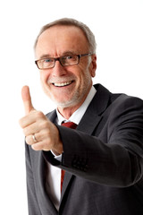 Senior business man, thumbs up