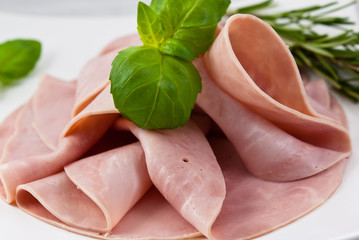 Sliced ham with herbs