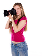 Young woman taking a photo with her camera