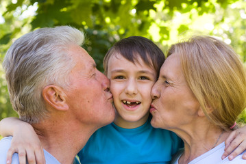 Fototapeta premium boy with grandparents
