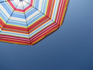 Umbrella in the sky, seaside holidays