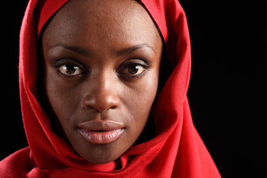 Headshot beautiful black african woman in hijab