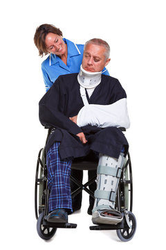 Nurse And Injured Man In Wheelchair Isolated