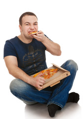 Portrait young man with a pizza