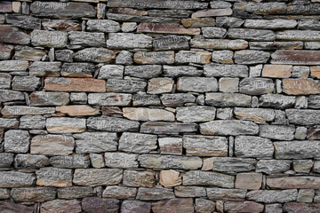 Wall built of natural stone