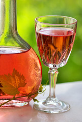 Glass and bottle of portuguese rose wine.