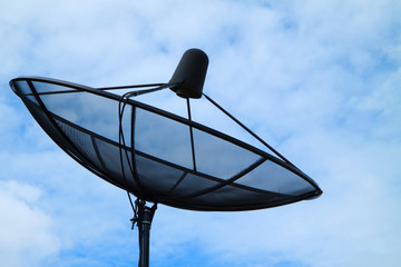 Satellite dish on blue sky