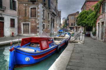 Fototapeta na wymiar Canal Barge in Venice, Italy.