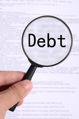 Magnifying glass in hand