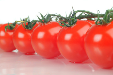 cherry tomatoes isolated on a white background