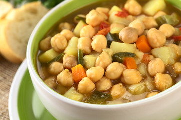 Vegetarian chickpea soup with carrots, potatoes, onions