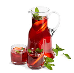 Fruit drink in jug and two glasses