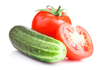 Ripe red tomatoes and cucumber isolated on white with Clipping P