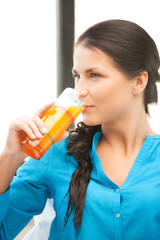 beautiful woman with glass of juice