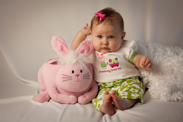 Baby Girl Leaning on Pink Easter Bunny Basket