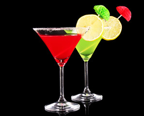 Martini glasses on black background