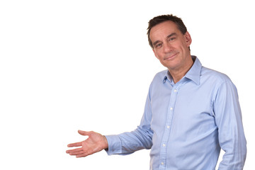 Attractive Smiling Middle Age Man Indicating Copy Space