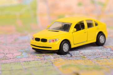 Yellow car and map