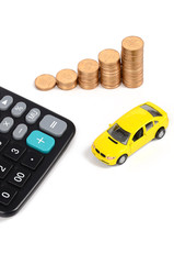 Calculator,coins and toy car