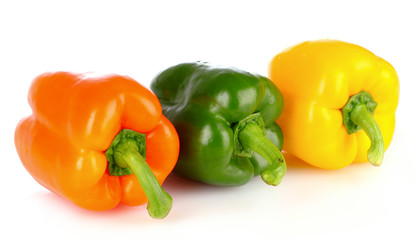 Three bell peppers isolated on white