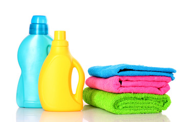 Detergent and towels isolated on white