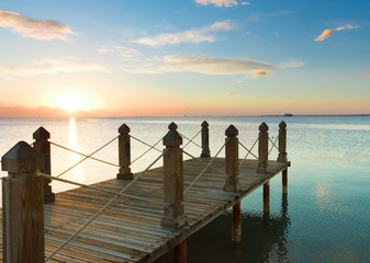 Pier over Sunset Waters