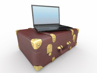Laptop and suitcase on white isolated background