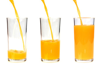 Pouring orange juice into the glass
