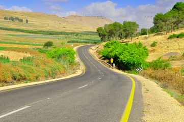 Curved highway in rural  area of Galilee district in Nothern Israel.