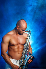 Fototapeta na wymiar Man playing sax