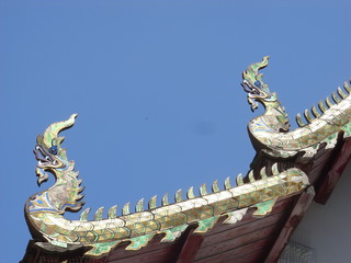 Fototapeta na wymiar Thai Buddhist temple roof detail