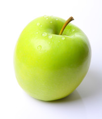 Image of green apple with water drops over white