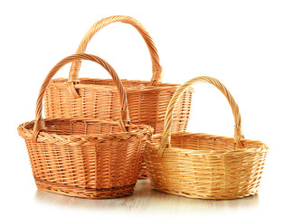 Fototapeta na wymiar Empty wicker baskets isolated on white
