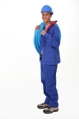 Studio shot of a plumber