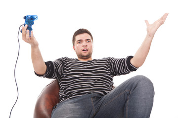 furious man with a joystick for game console
