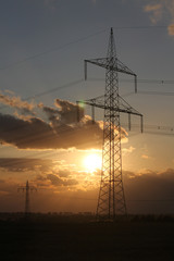 electrical tower pylon and sunset