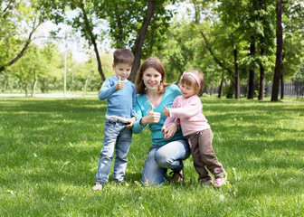 Fototapeta premium Portrait of mother and children in the park
