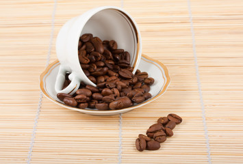 Cup and coffee beans