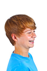 portrait of happy boy with blue shirt in studio