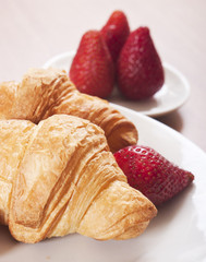 croissants close up with strawberry