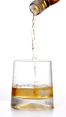 Pouring whiskey into glass